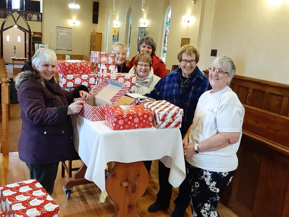 St. Luke's Parish preparing for the holiday season by filling shoe boxes for the Mission to Seafarers.